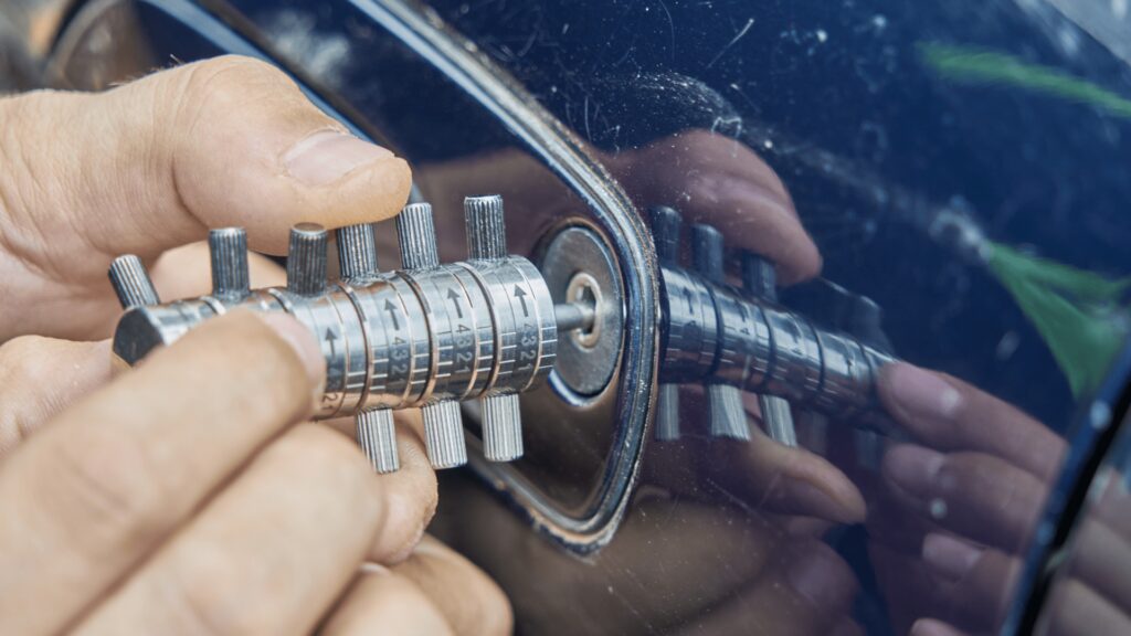 Locksmith using a car lock decoder to make new car key without original
